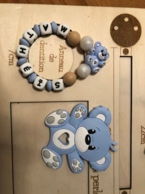 img_1518 2 portes clés + anneau de dentition -🤍