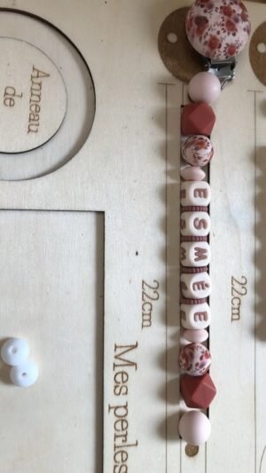 Lot attache + anneau de dentition Esmee - Charlotte (+MAM)